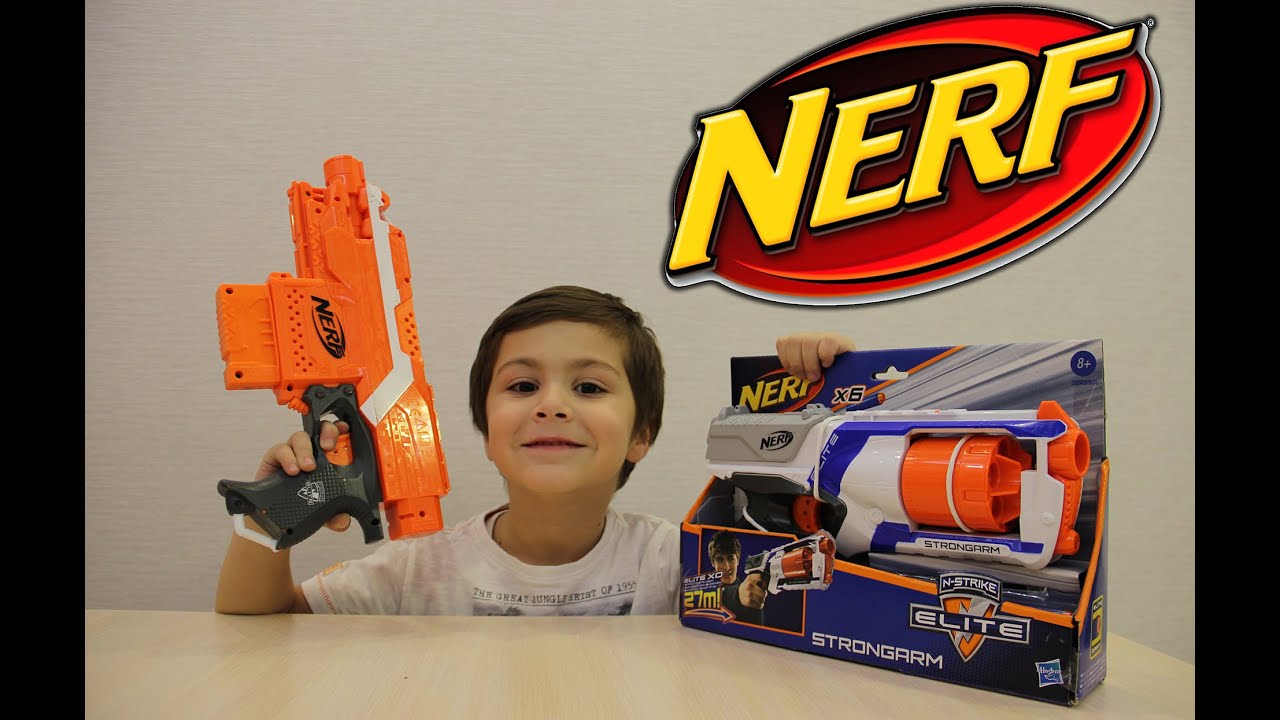 Бластер НЕРФ СТРОНГАРМ распаковка пушки и стреляем по целям находим сюрпризы  Nerf Blaster STRONGARM