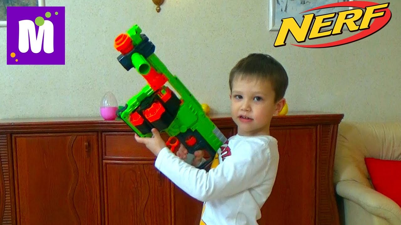 НЕРФ Бластер Зомби Страйк распаковка игрушечного оружия, стреляем по яйцам