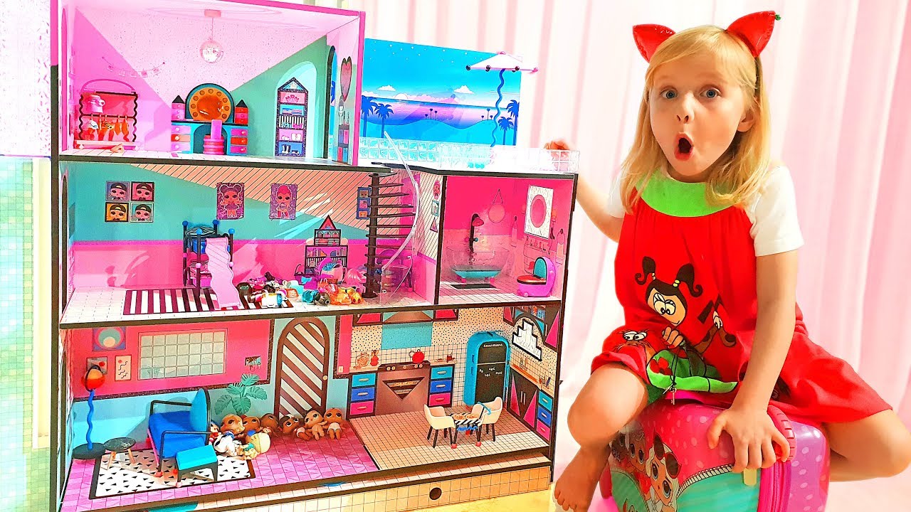 Alisa and new playhouse for dolls