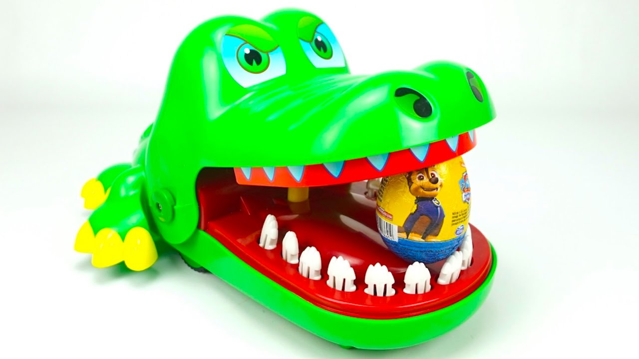 Сюрпризы и игрушка крокодил кусака