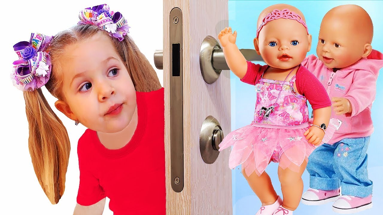 Diana and crying Baby Born dolls behind the door