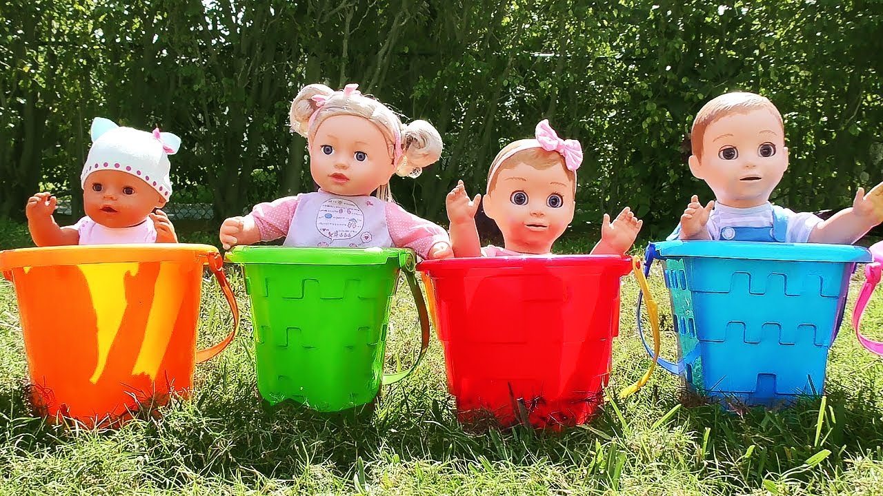 Diana Pretend Play with Baby dolls and colored buckets