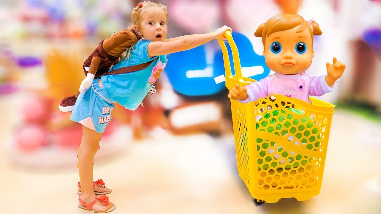 Nastya and baby doll doing shopping - song for kids Nursery Rhyme by Nastya at the candy shop